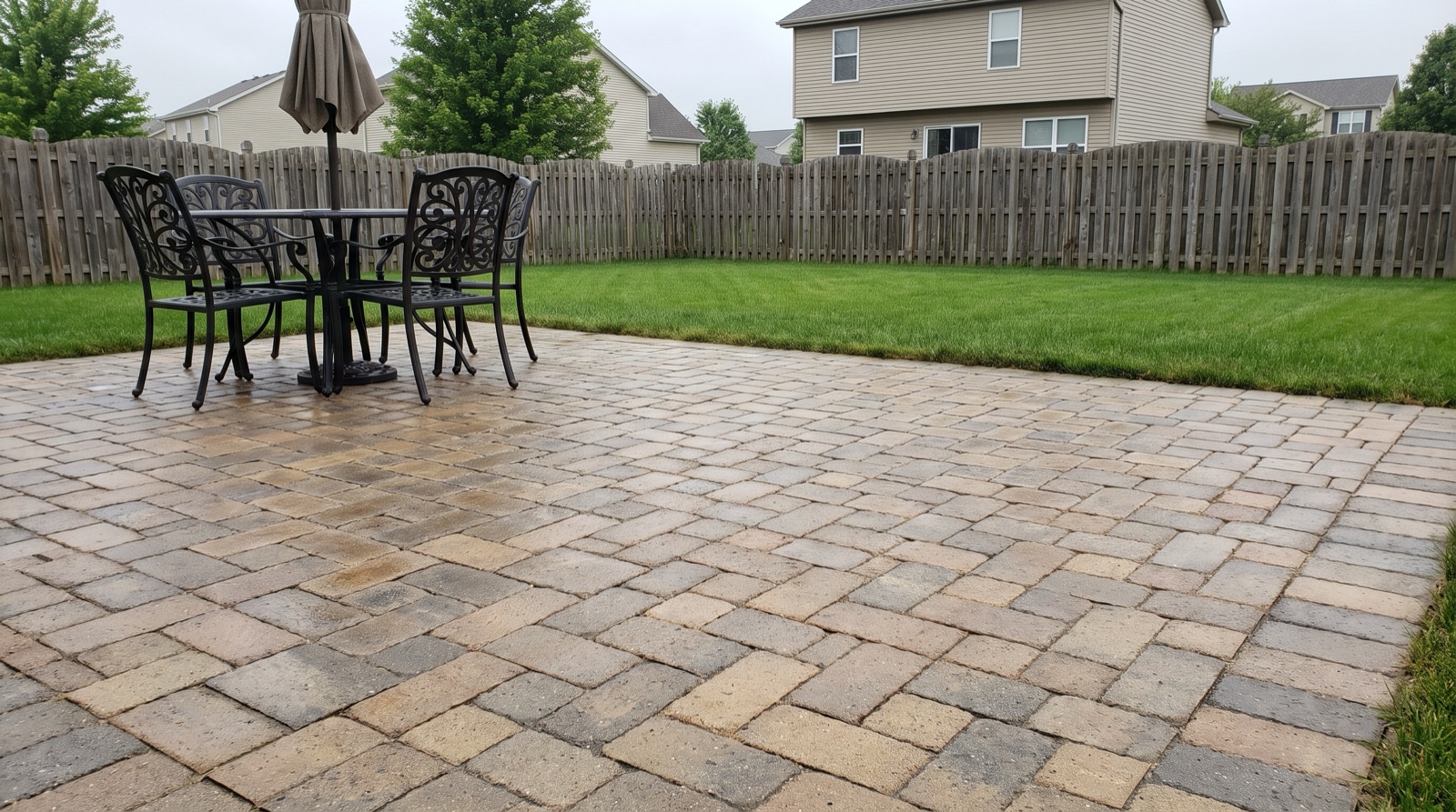 A freshly cleaned paver patio behind a Columbus home